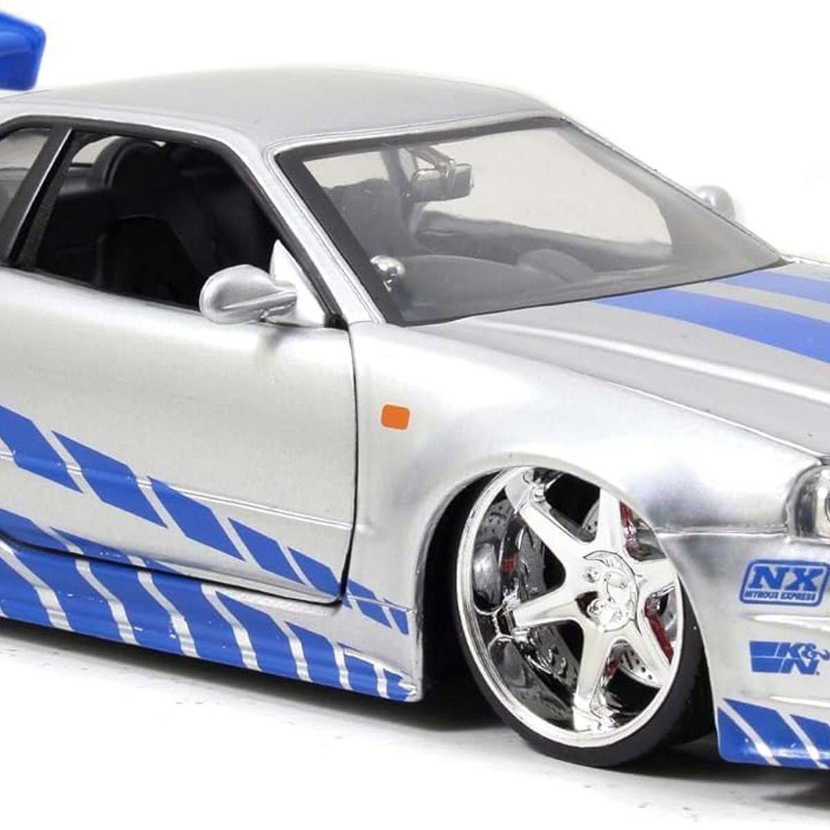 JADA TOYS - Auto Nissan Skyline GT-R R34 2002 Rápido y Furioso Escala 1:24 Coleccionable Modelo Deportivo Réplica de Colección