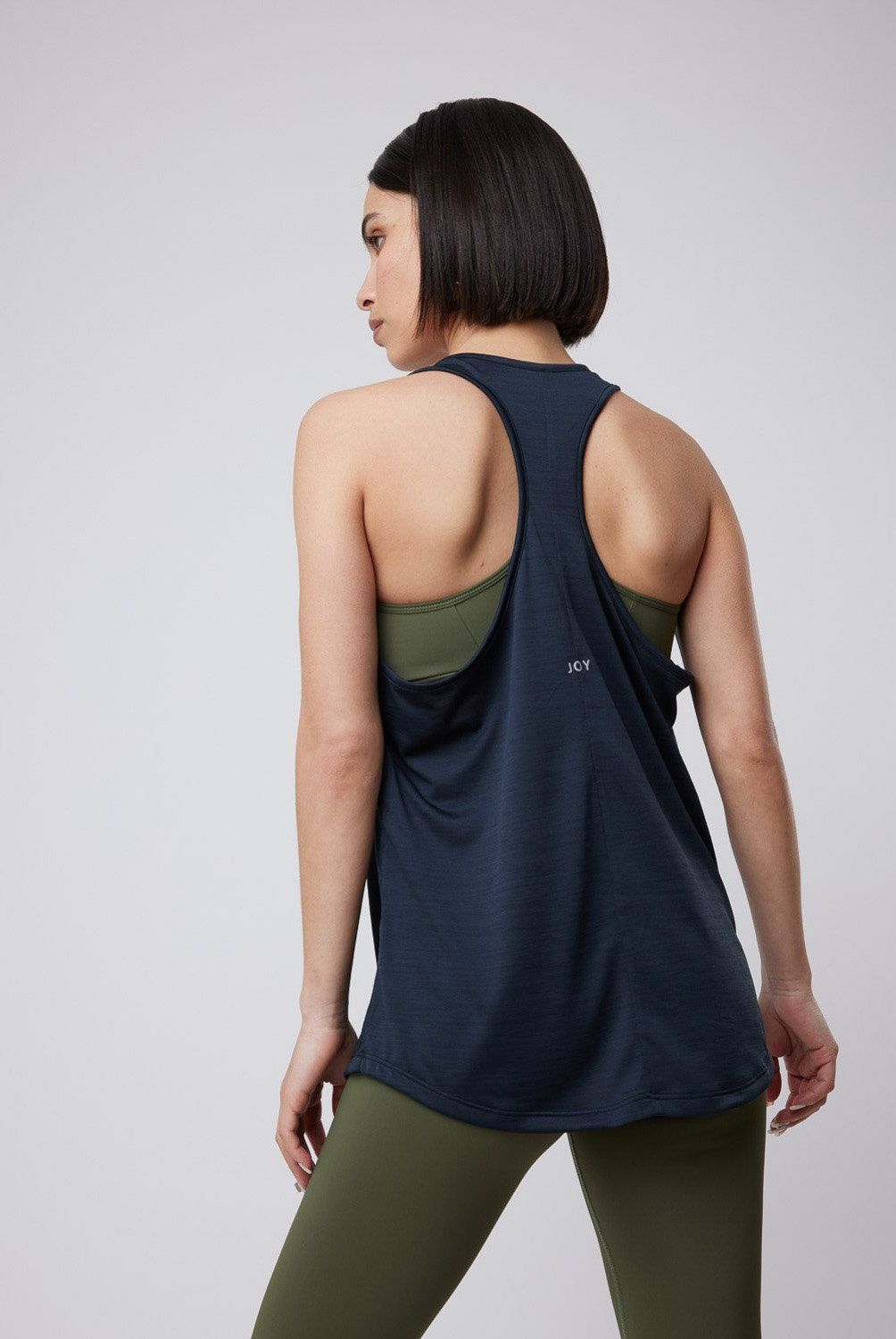 JOYFITTERS - Polera Sin Mangas Fitness Mujer Joyfitters