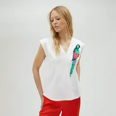 LOLA CASADEMUNT - Polera Detalle Loro Mujer