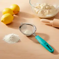 MICA - Colador Acero Inoxidable Mango Soft Touch Turquesa