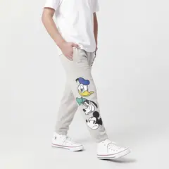 STD CHARACTERS - Pantalón de Buzo Niño