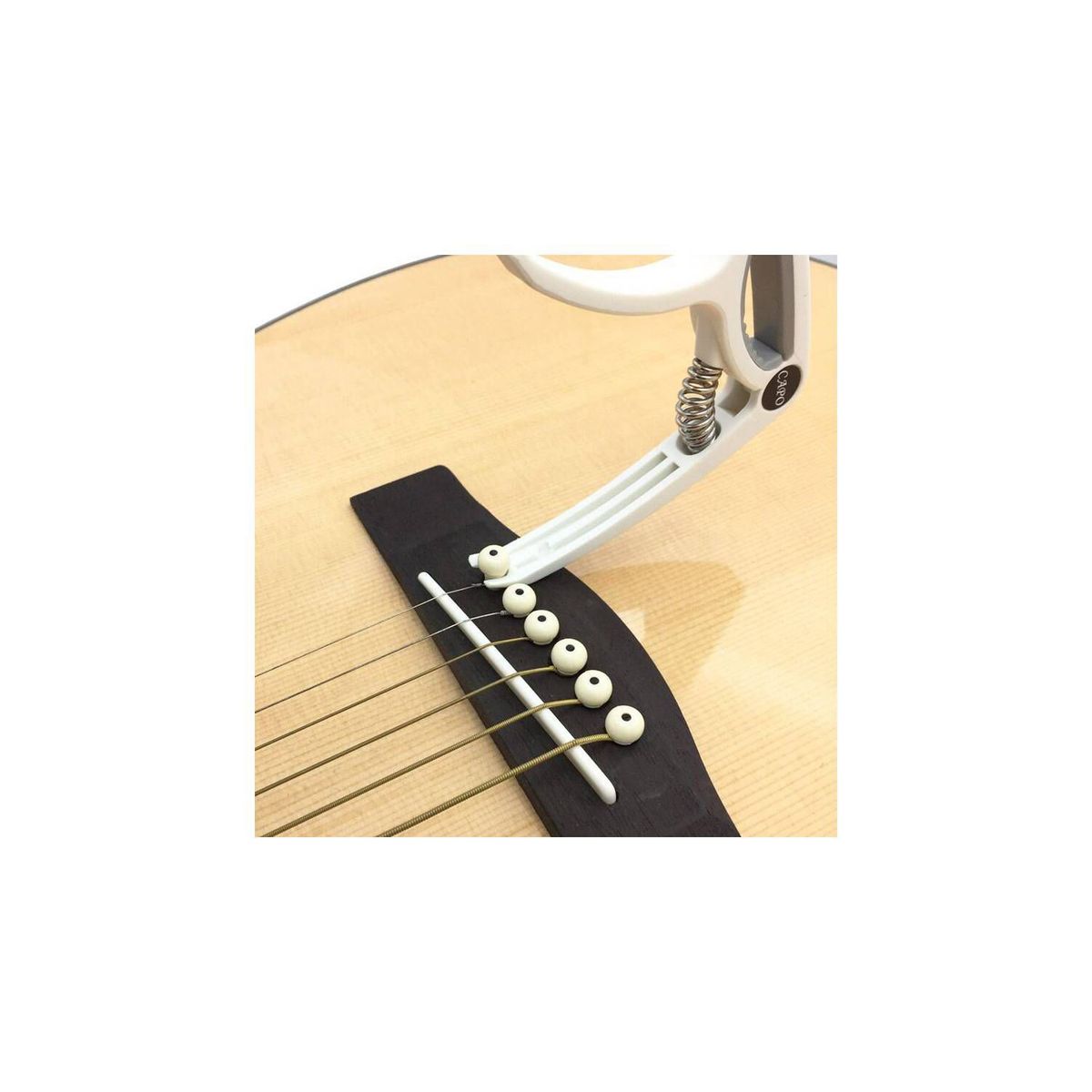 UBMD - Capo guitarra acustica clasica plastico resorte