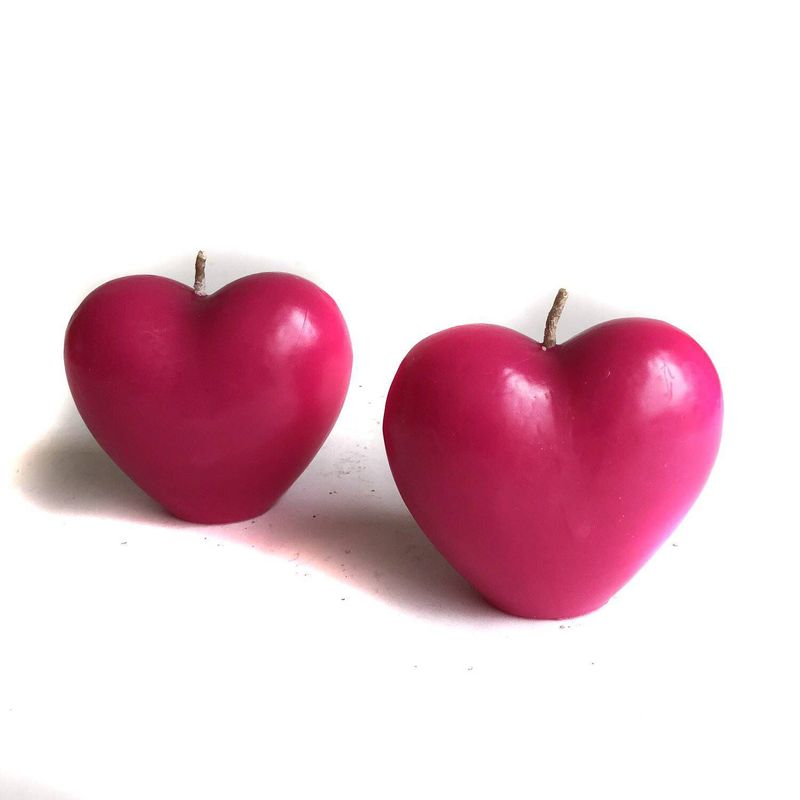 EGG PRODUCTOS DE PAZ - Set 2 velas corazón fucsia.