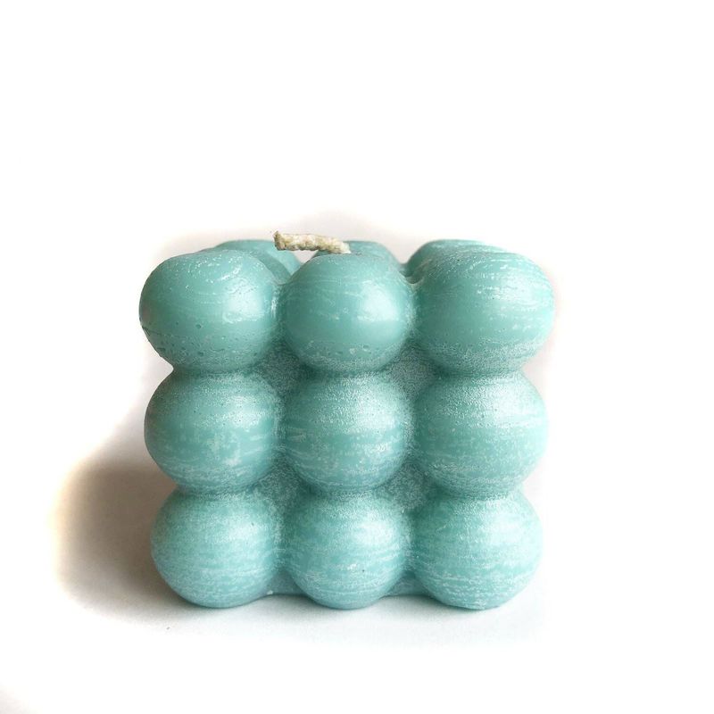 EGG PRODUCTOS DE PAZ - Vela cubo  turquesa.