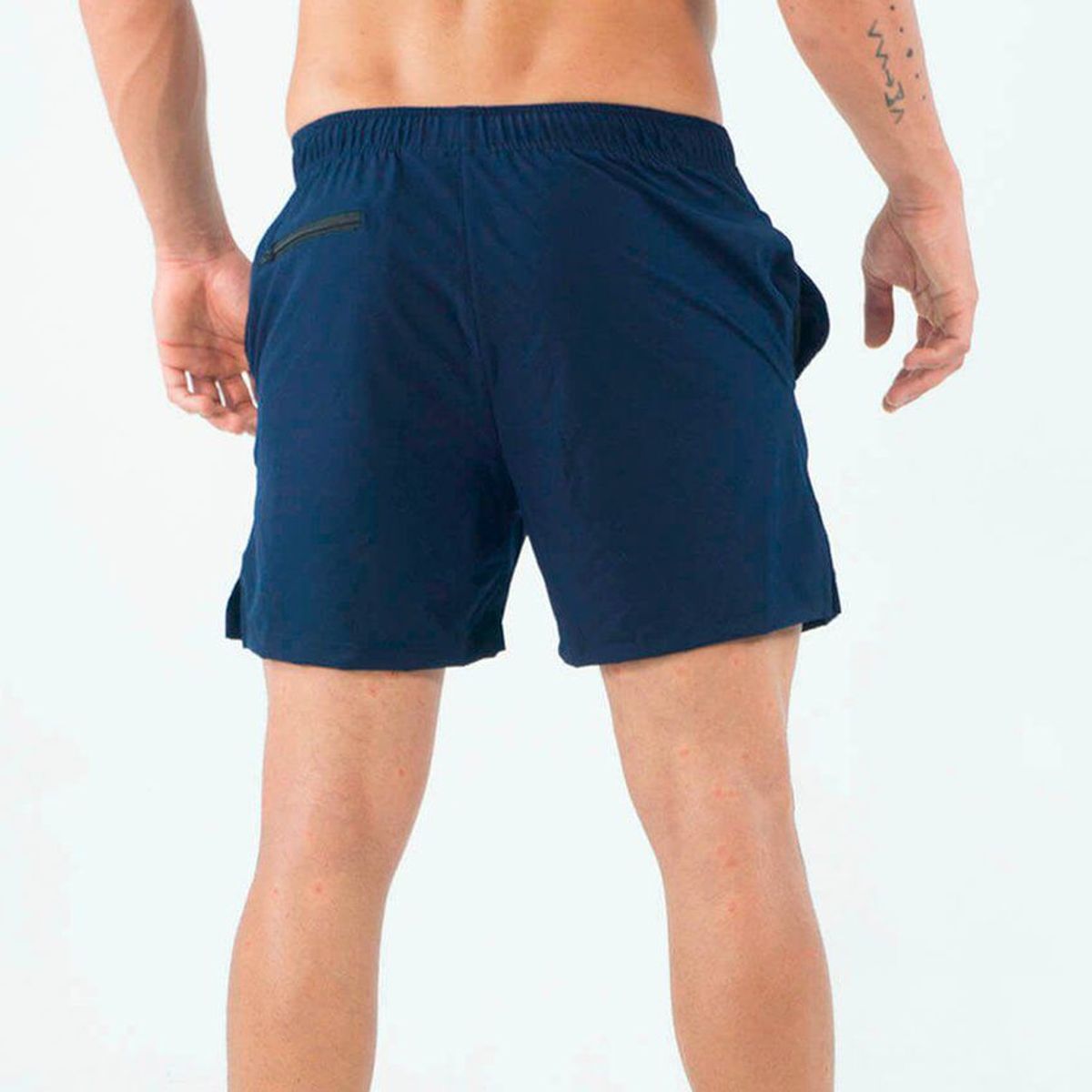 NO RULES - Pantaloneta deportiva hombre ajustada azul oscuro_..