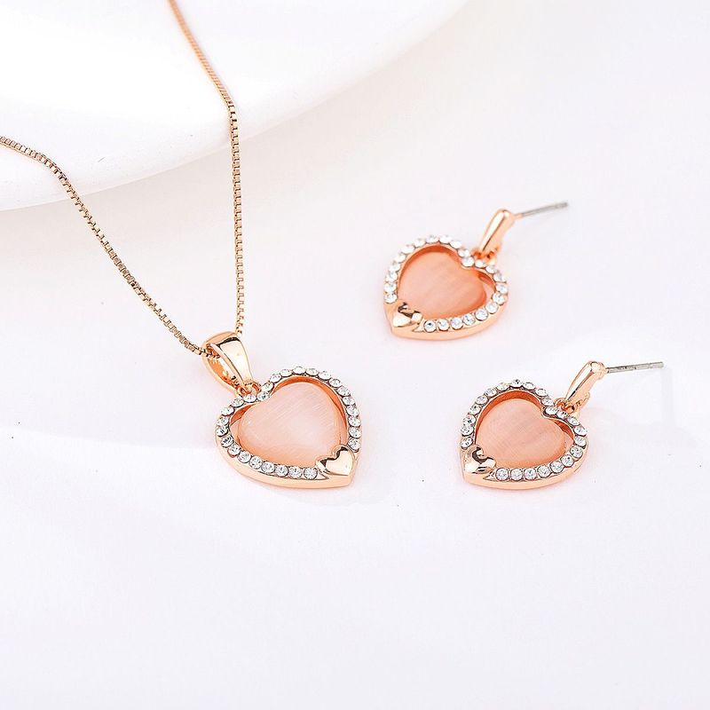 VERAMOREST - Set Aretes y Collar Veramorest- Corazón rosa