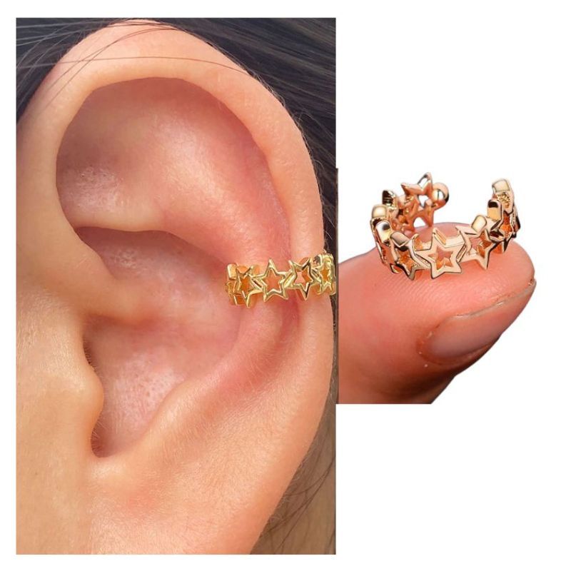 ACCESORIOS DE EVA - Arete Ear Cuff Simulador Estrellas Doradas_.