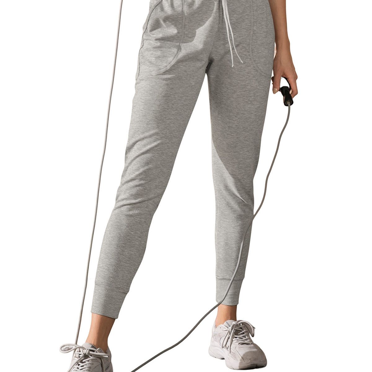 LEONISA - Jogger deportivo de silueta amplia con bolsillos.