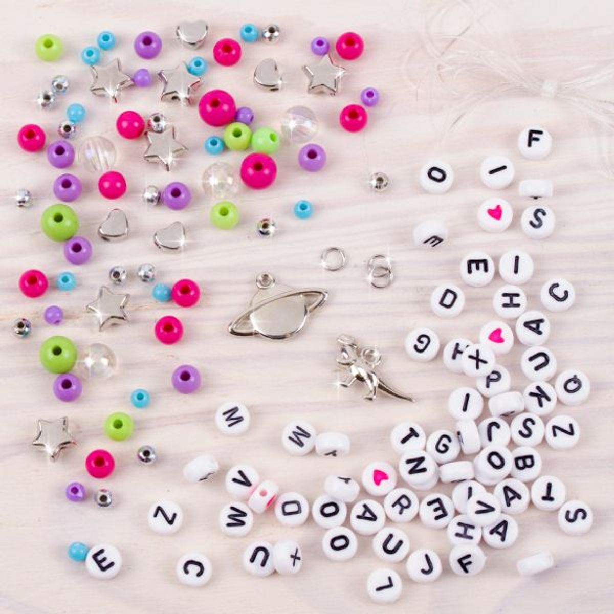 MAKE IT REAL - PULSERAS CON CHARMS Y LETRAS