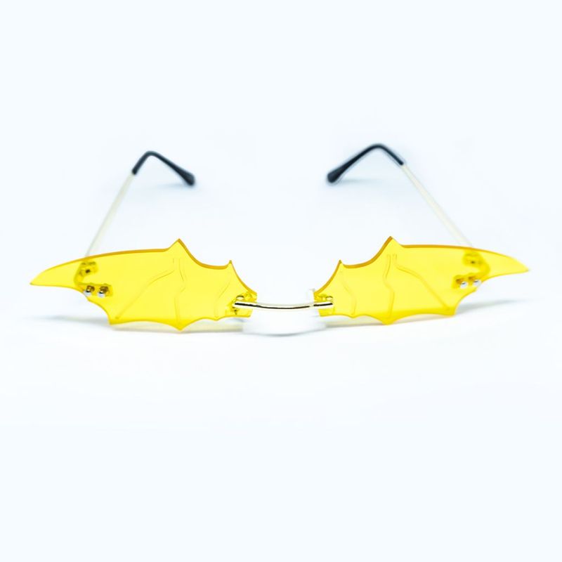 AT NIGHT SUNGLASSES - Gafas de sol At Night lente murcielago sin marco unisex Amarillo