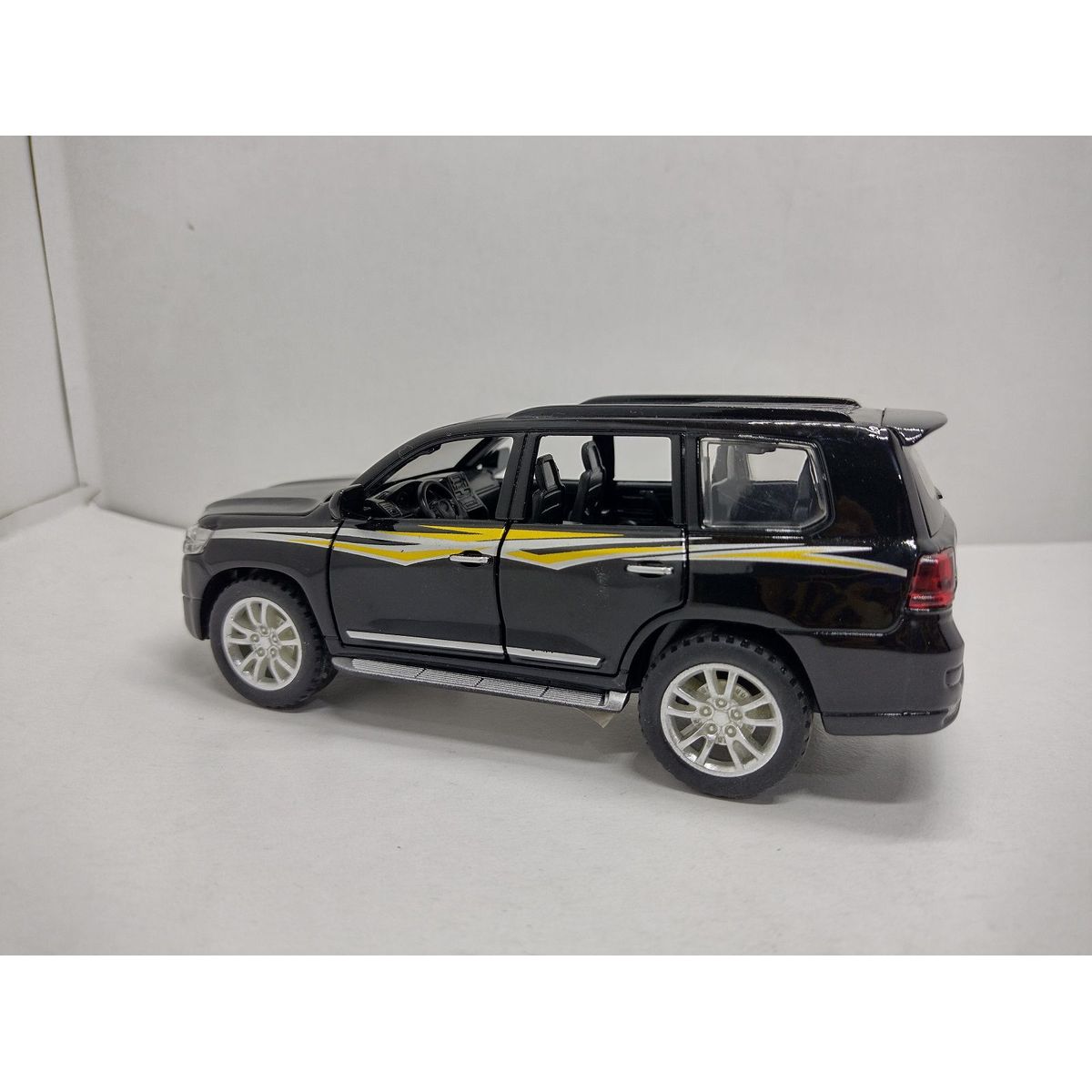 JADA TOYS - CAMIONETA TOYOTA LC200 NEGRA a Escala 132