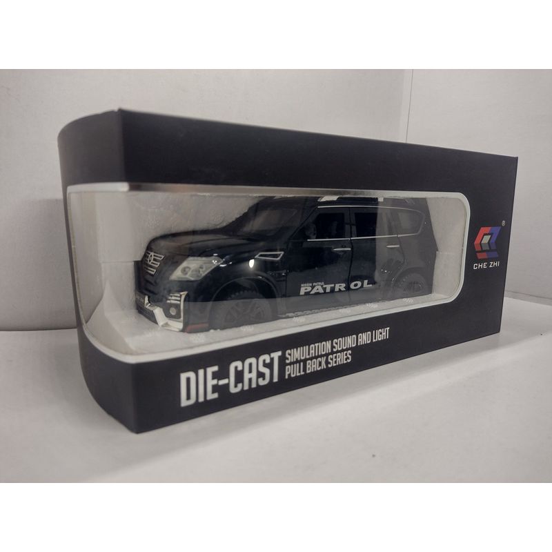 JADA TOYS - CAMIONETA NISSAN PATROL EN CAJA negra a Escala 124