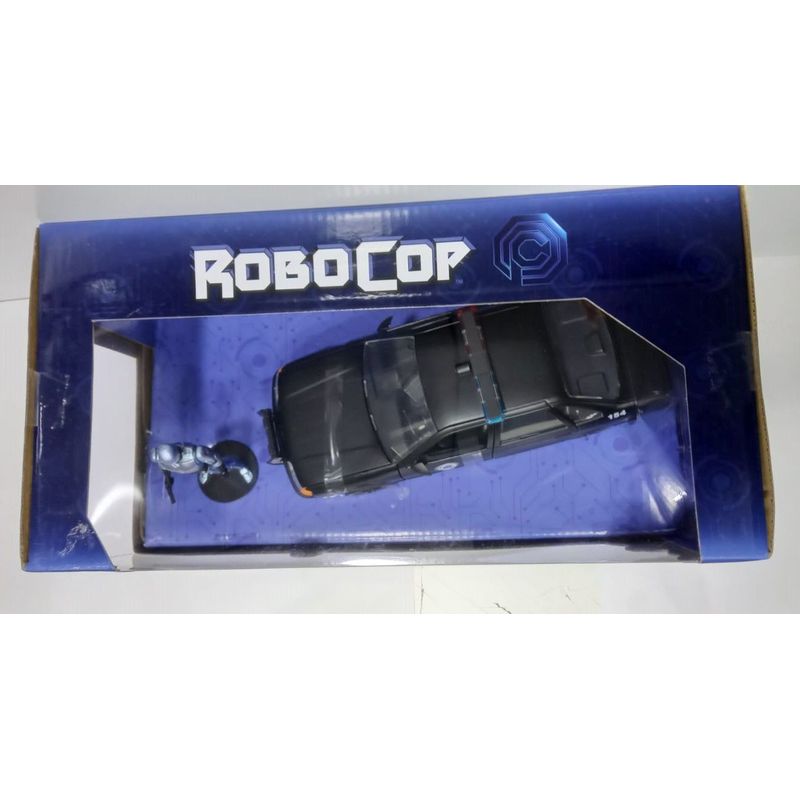 JADA TOYS - FIGURA Y CARRO ROBOCOP OCP FORD TAURUS A Escala 124