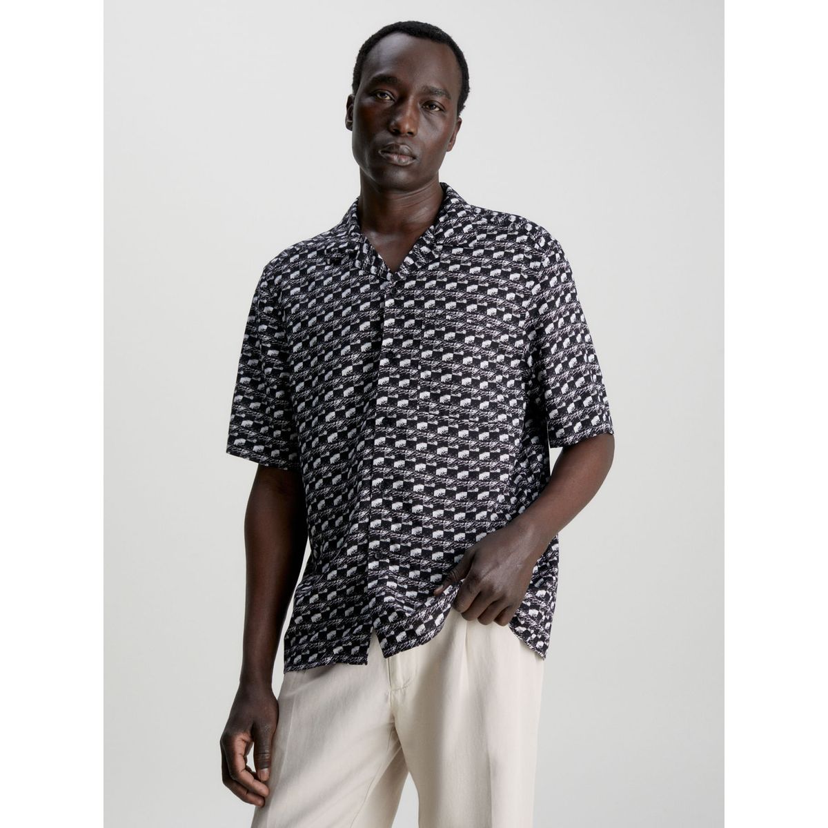 CALVIN KLEIN - Camiseta Negro Boxy Con Estampado De Bolos Calvin Klein