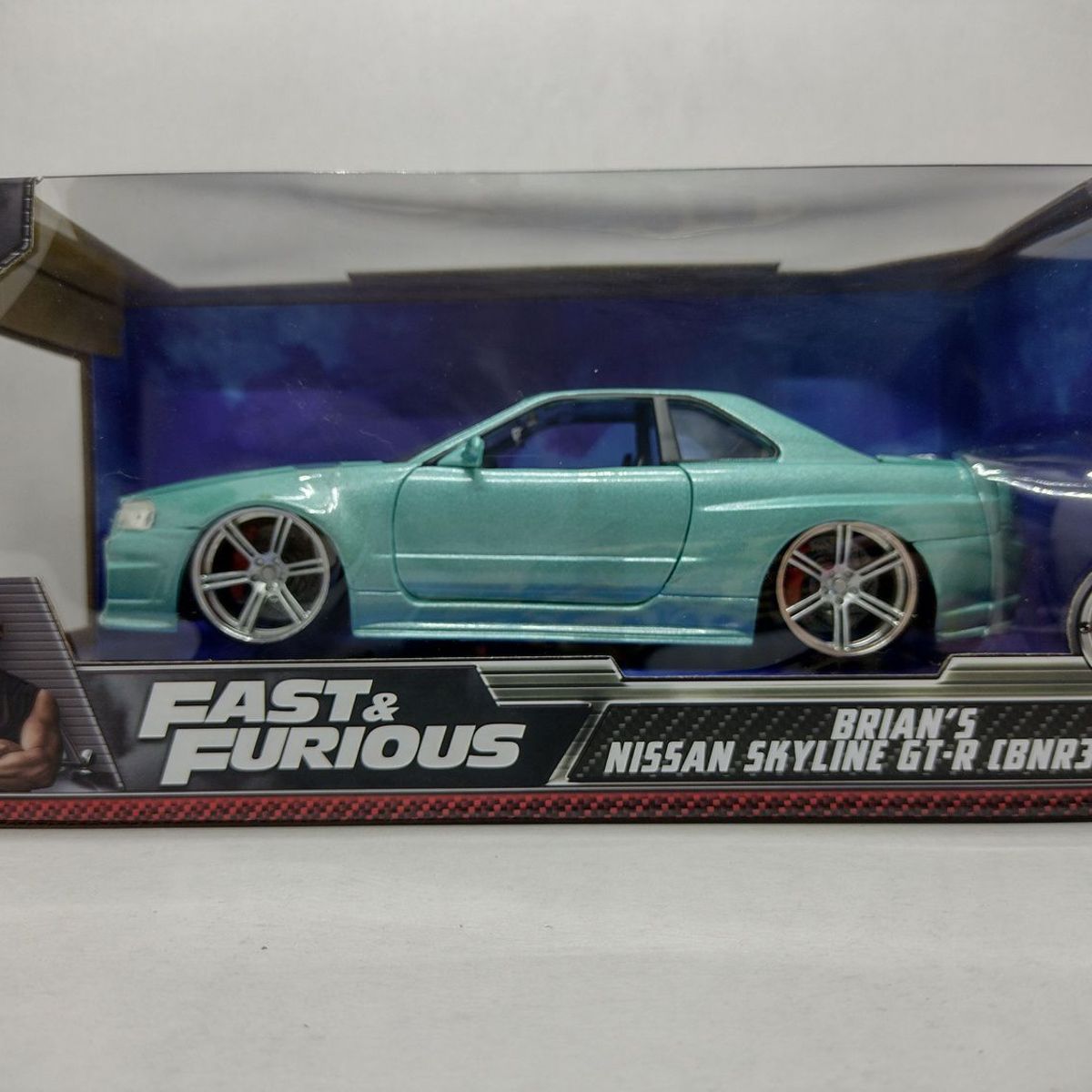 JADA TOYS - CARRO BRIAN´S NISSAN SKYLINE GT-R BNR34 VERDE MENTA PERLADO