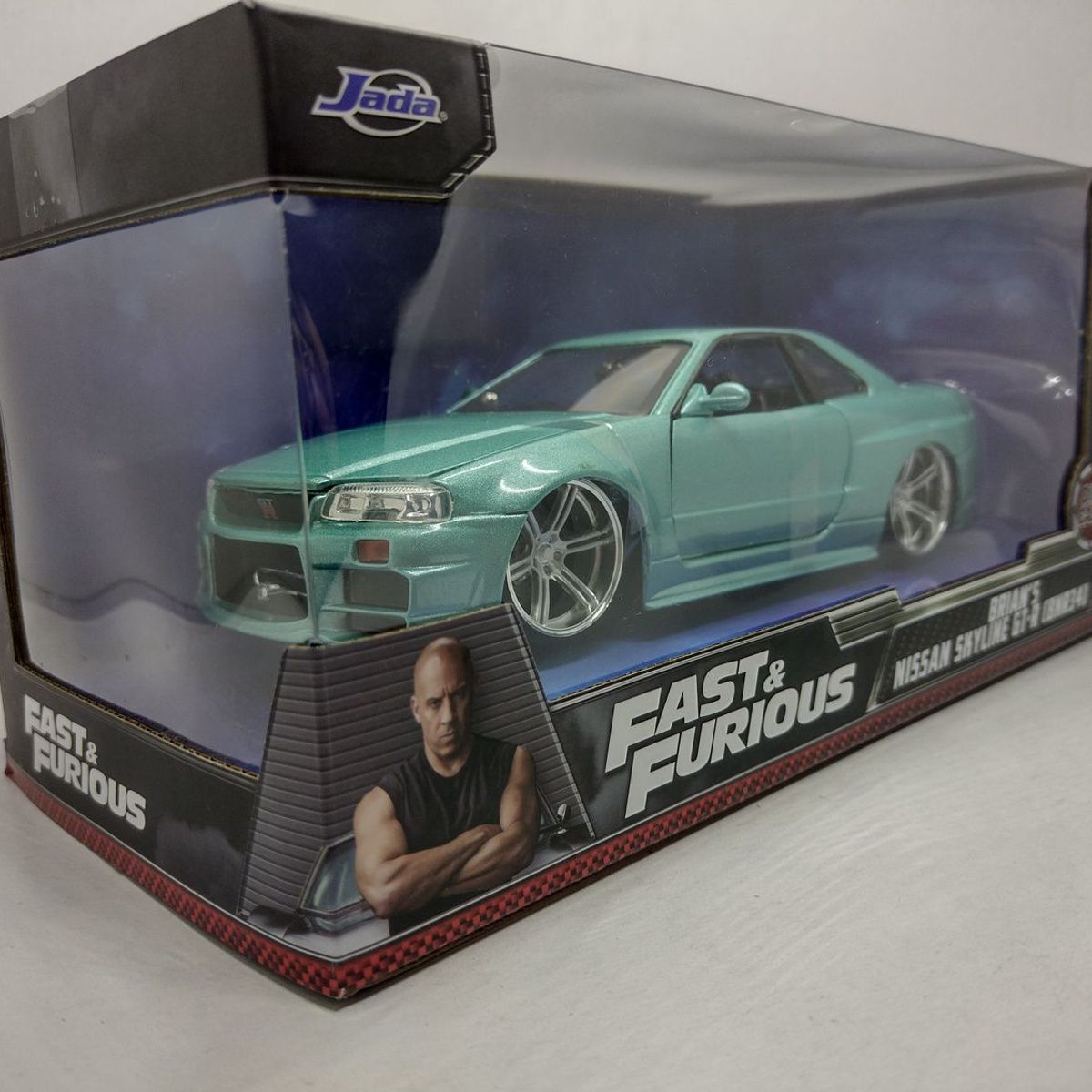 JADA TOYS - CARRO BRIAN´S NISSAN SKYLINE GT-R BNR34 VERDE MENTA PERLADO