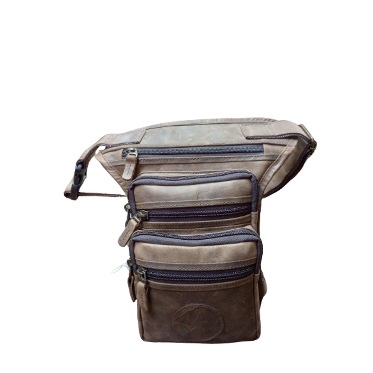 GENERAL - CANGURO DE PIERNA EN CUERO DE BOVINO CON 6 COMPARTIMENTOS.