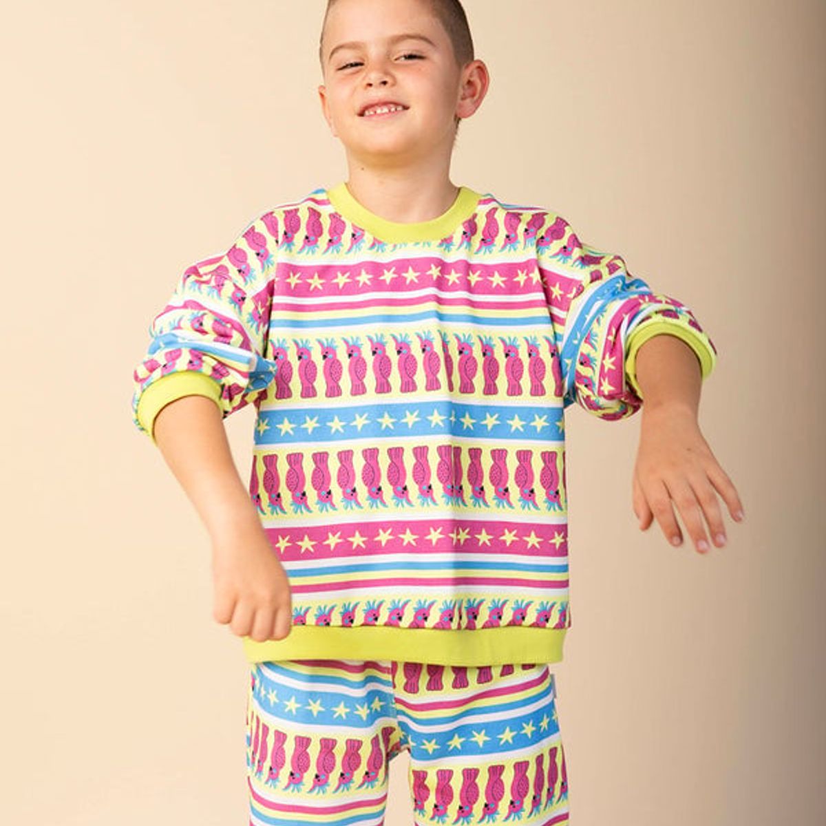 DOSOJOS - Conjunto para niñas y niños de buzo y jogger algodón peruano cacatúas