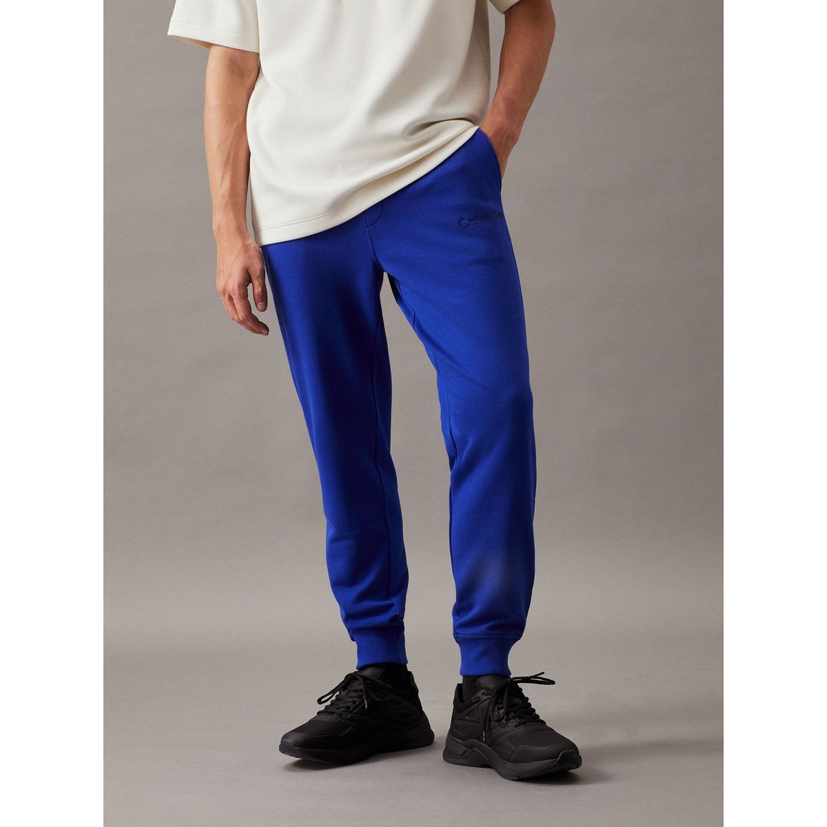 CALVIN KLEIN - Pantalón azul de chándal de felpa de algodón Calvin Klein