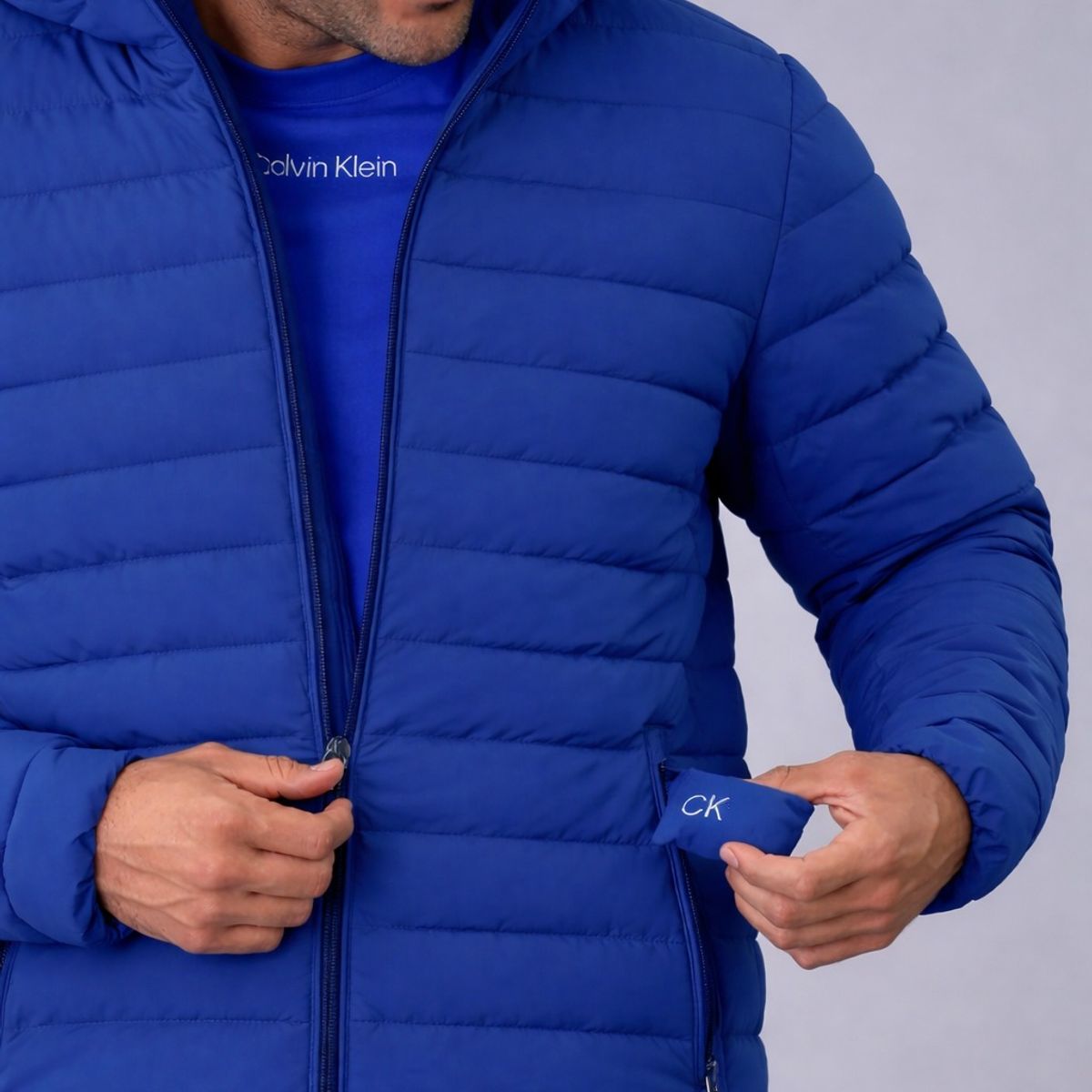 CALVIN KLEIN - Chaqueta azul acolchada con capota Calvin Klein