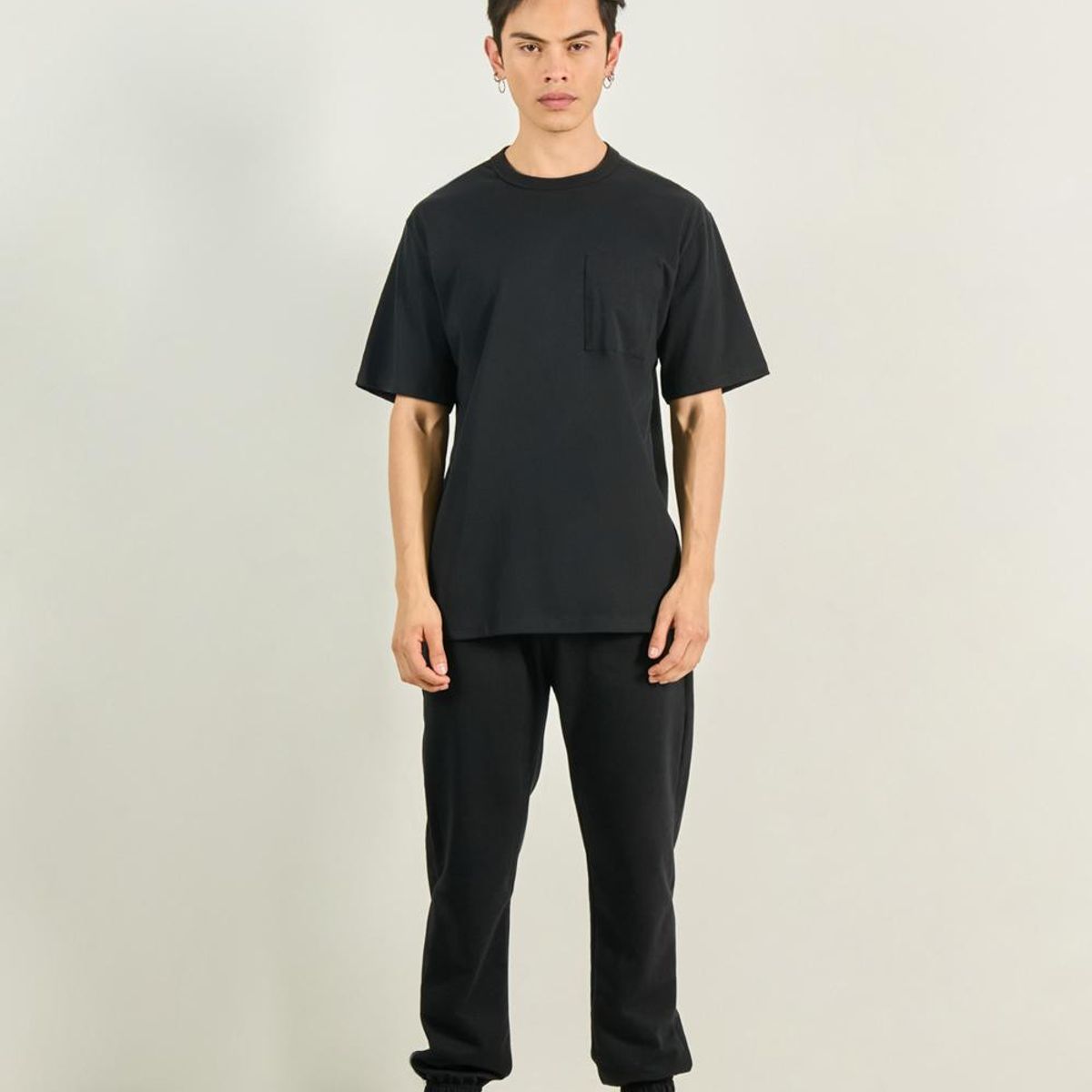 KOAJ - KOAJ Camiseta oversize unicolor con manga corta y bolsillo Hombre