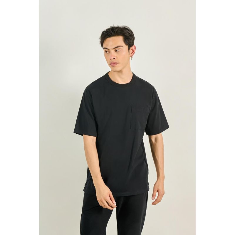 KOAJ - KOAJ Camiseta oversize unicolor con manga corta y bolsillo HOMBRE