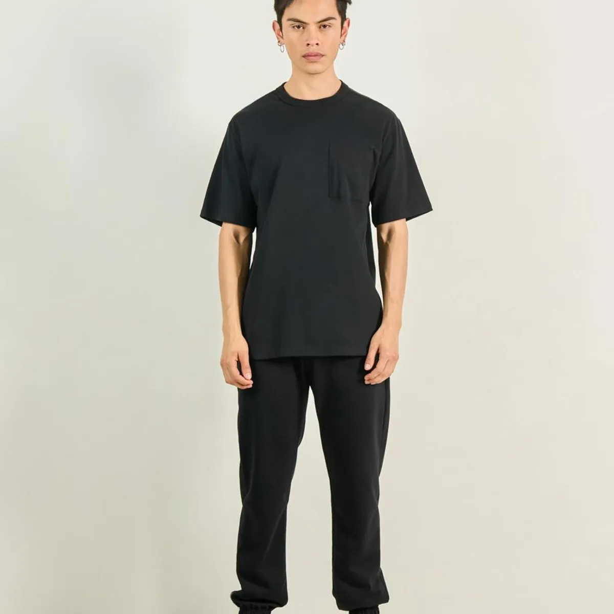 KOAJ - KOAJ Camiseta oversize unicolor con manga corta y bolsillo Hombre