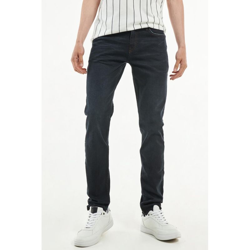KOAJ - KOAJ Jean slim azul intenso con costuras cafés, tiro bajo y 5  HOMBRE