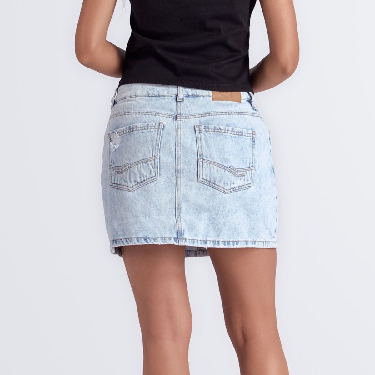 UNSER - Falda Corta Con Proceso Y Bolsillos Unser