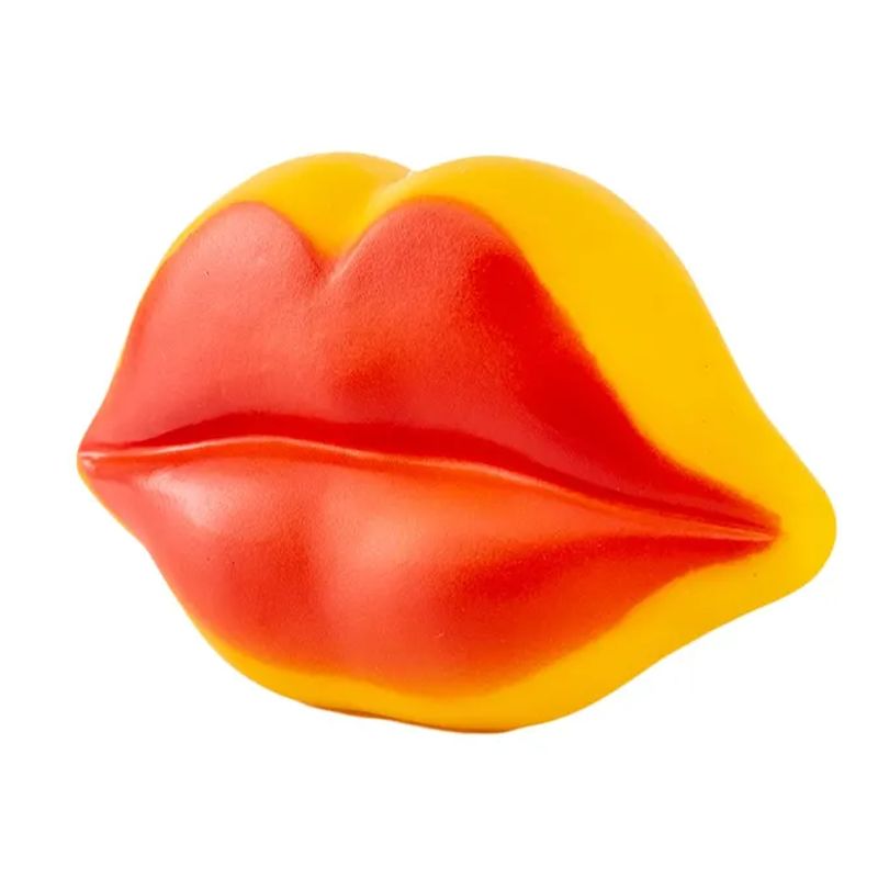 GENERICO - Juguete Mascotas Caucho Diseño Beso 1 pz