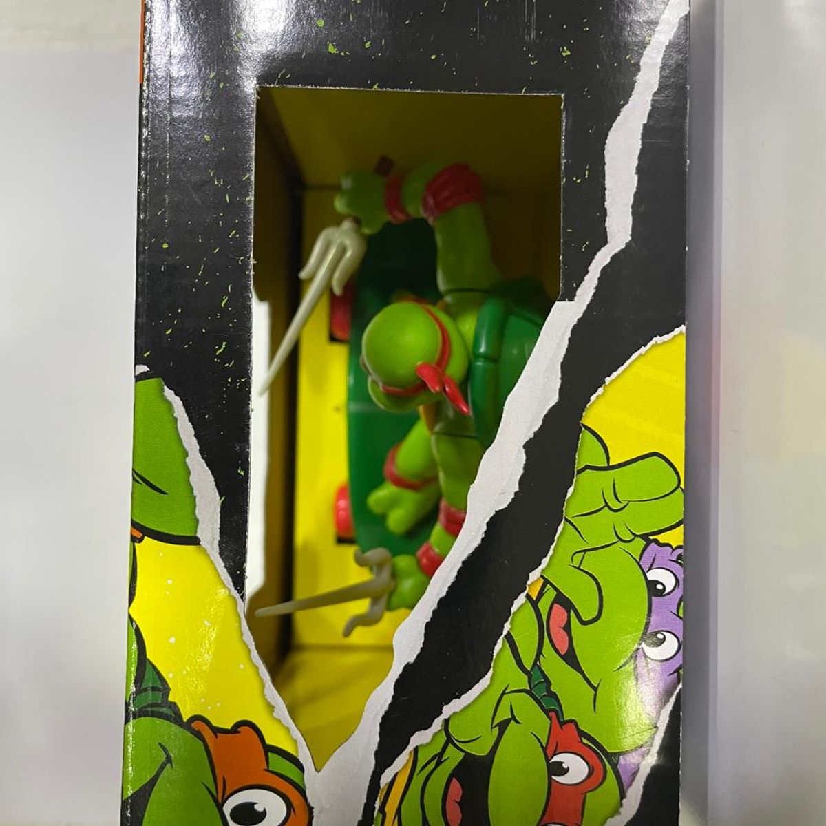 GENERICO - FIGURA TORTUGA NINJA EN PATINETA CON IMPULSO RAPHAEL