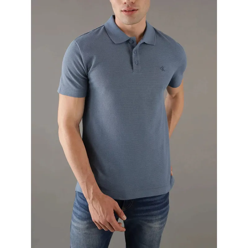 CALVIN KLEIN - Polo azul textured con monograma Calvin Klein