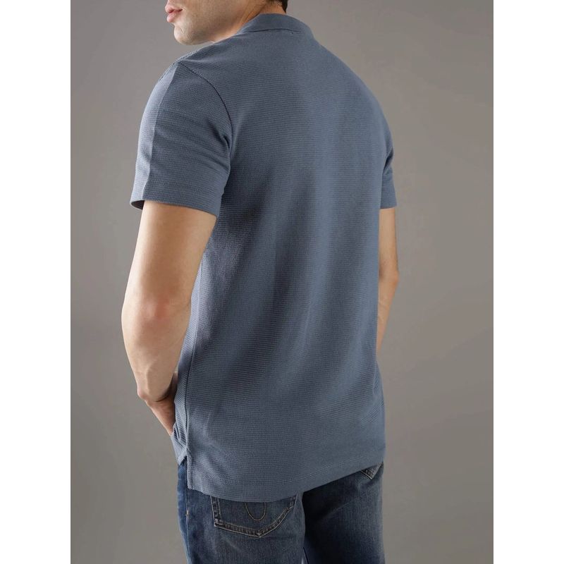 CALVIN KLEIN - Polo azul textured con monograma Calvin Klein