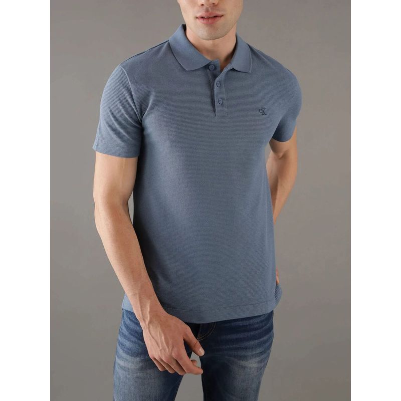 CALVIN KLEIN - Polo azul textured con monograma Calvin Klein