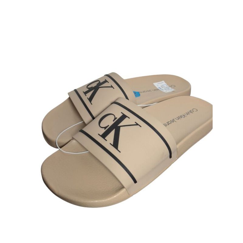 CALVIN KLEIN - Chancleta beige con monograma en relieve carina Calvin Klein