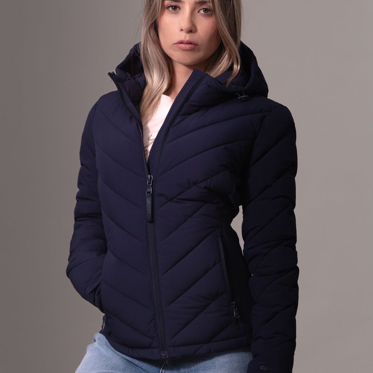 CALVIN KLEIN - Rompe azul viento plegable con estiramiento Calvin Klein