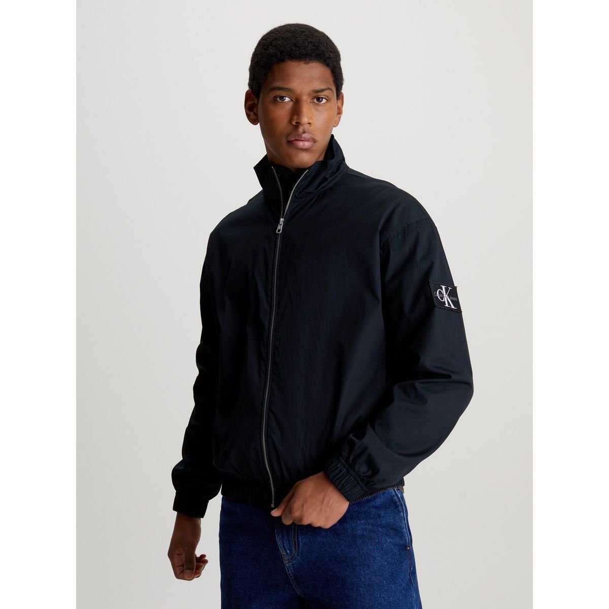 CALVIN KLEIN - Rompe viento negro relaxed de algodón con cremallera Calvin Klein