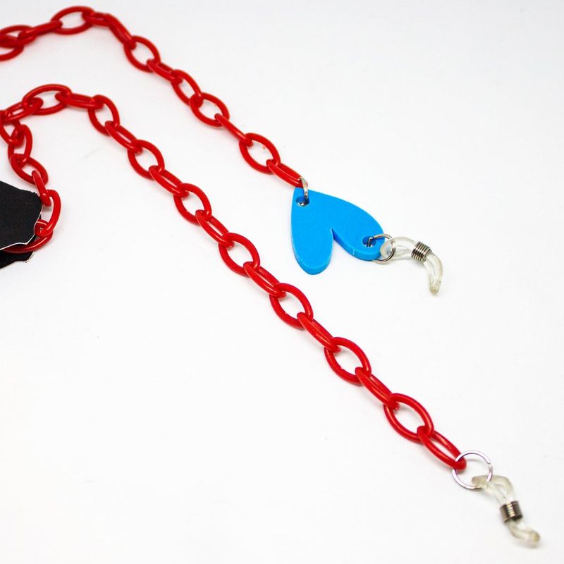 AT NIGHT SUNGLASSES - Cuelga Gafas Infantil Acrílico Geométrico Rojo con Corazon Azul
