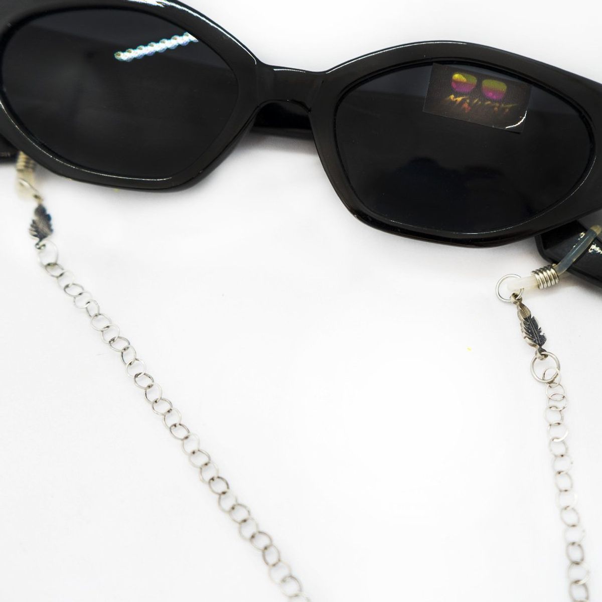 AT NIGHT SUNGLASSES - Cuelga Gafas At Night  Acero Inoxidable Plateado con Plumitas