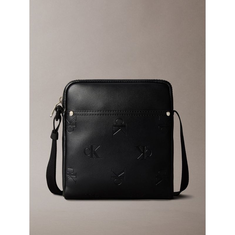 CALVIN KLEIN - Bolso negro cruzado con monograma grabado en toda la pieza Calvin Klein