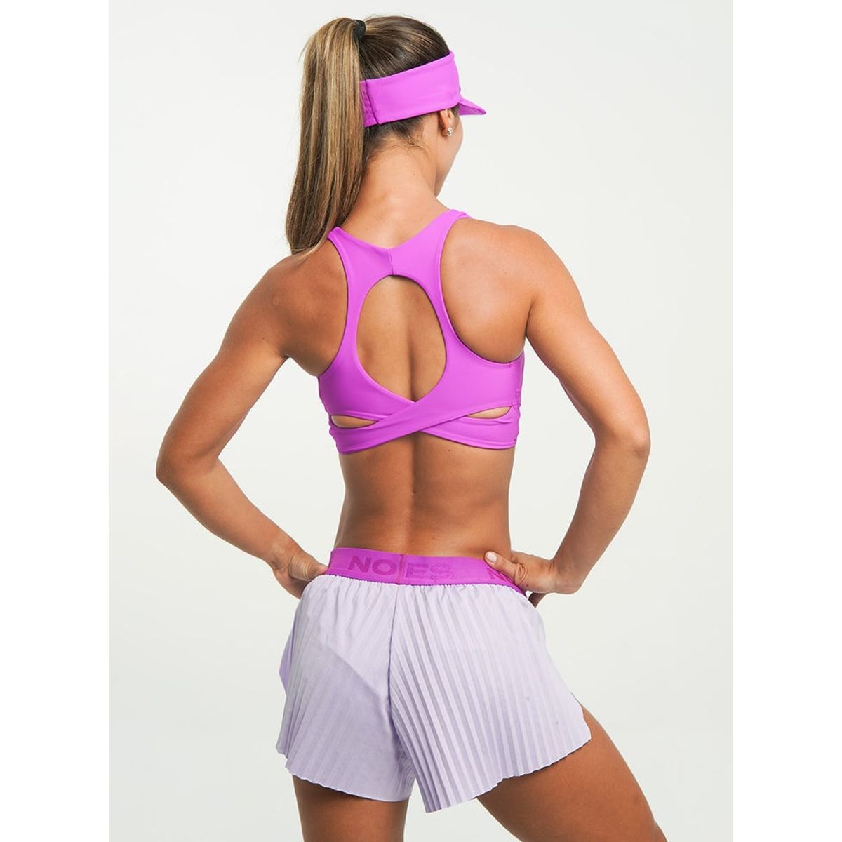 NO RULES - TOP DEPORTIVO GLOW FIT MAGENTA.