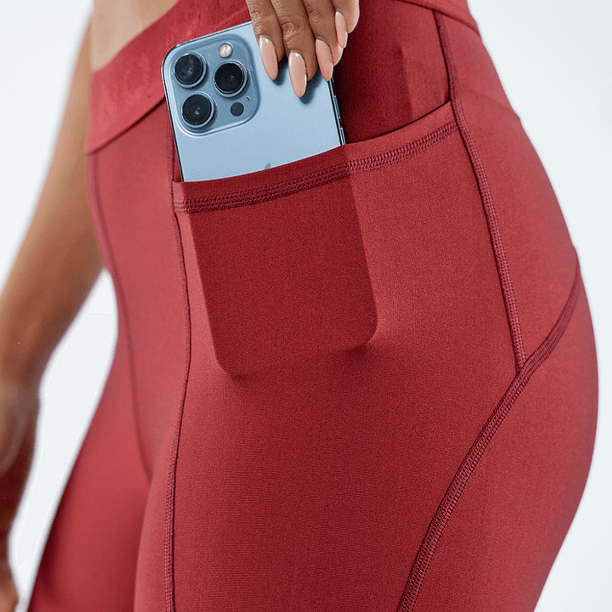 NO RULES - LEGGINS DEPORTIVO VINOTINTO CON ELASTICO.