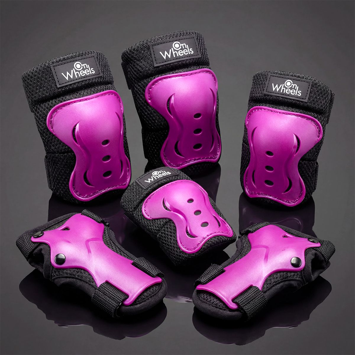 ONWHEELS - Set de protecciones Onwheels Regular Fit Fucsia tll M