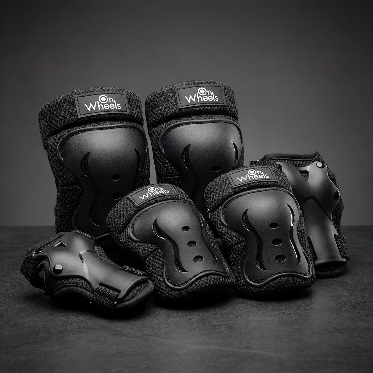 ONWHEELS - Set de protecciones Onwheels Regular Fit Negro tll M