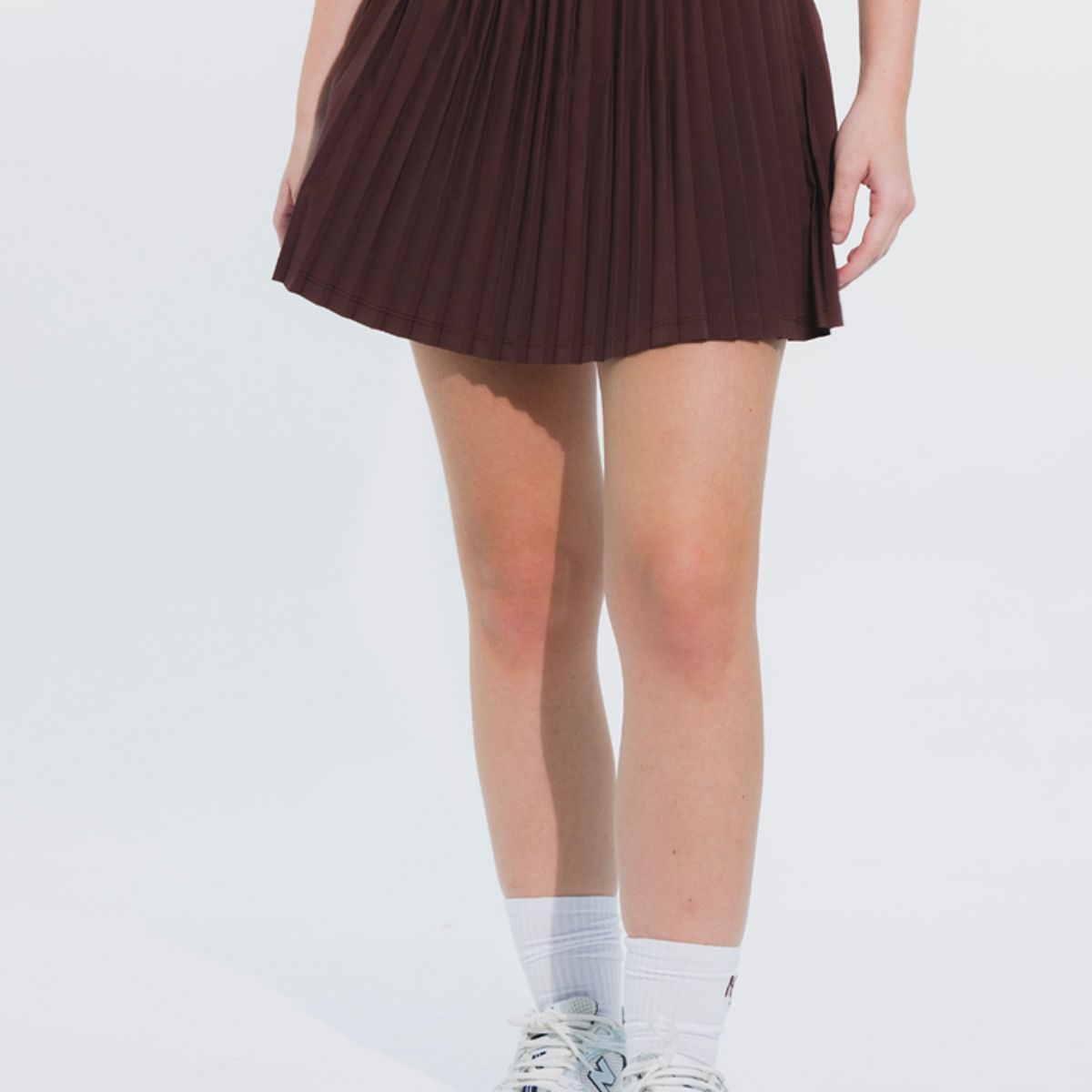 NO RULES - FALDA SHORT DEPORTIVA PLEAT CAFÉ.