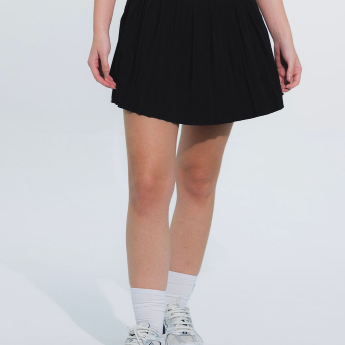 NO RULES - FALDA SHORT DEPORTIVA PLEAT NEGRO.