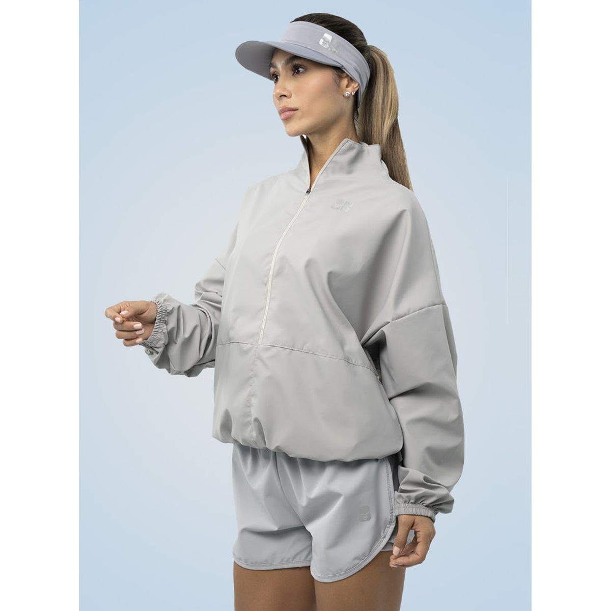 NO RULES - CHAQUETA CORTAVIENTOS GRIS.