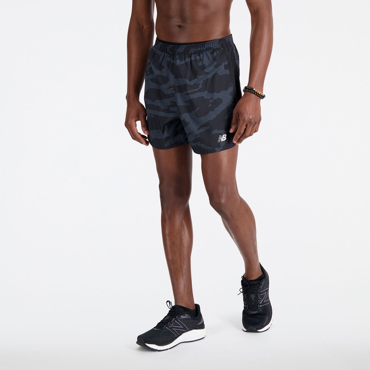 NEW BALANCE - Pantaloneta New Balance Original Accelerate Negro Hombre
