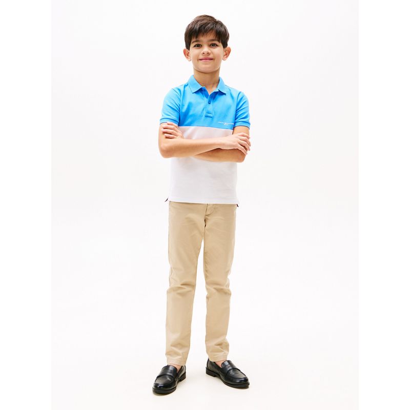 TOMMY HILFIGER - Polo celeste con diseño colorblock con logo Tommy Hilfiger