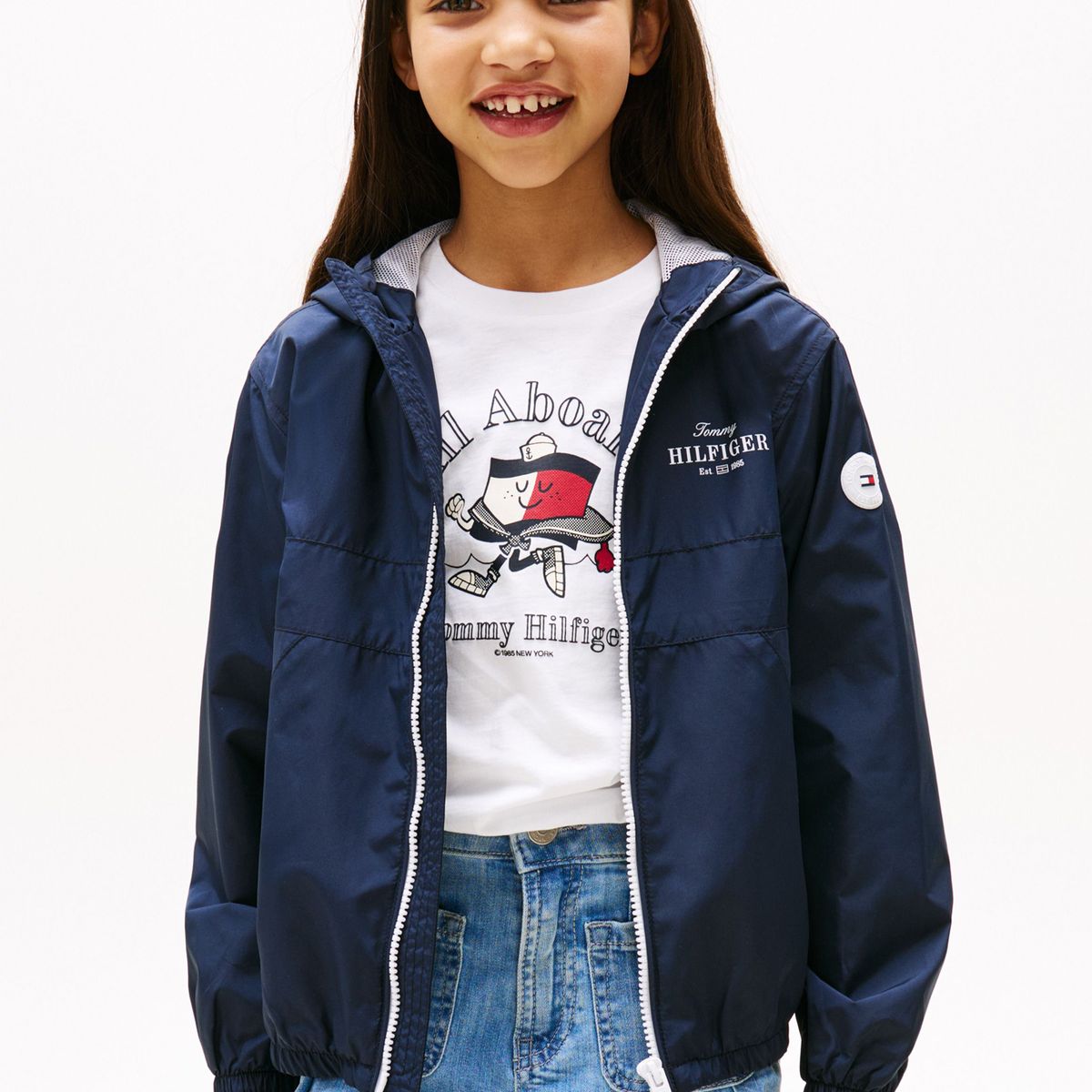 TOMMY HILFIGER - Cortavientos azul con capota y logo Tommy Hilfiger